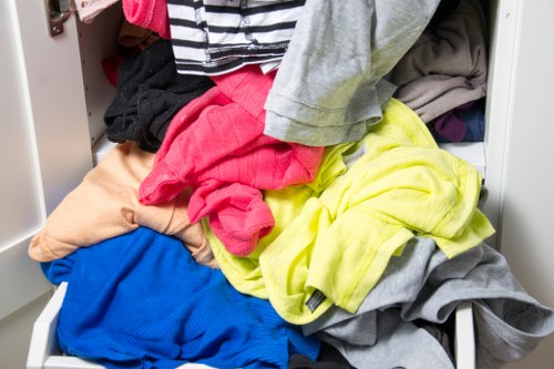 Staff reviewing an accessibility checklist for office removal and clearance services in Swiss Cottage.